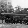 Marine grunts load aboard a new CH-53